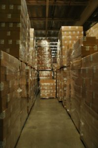 A picture of a warehouse that is crammed full