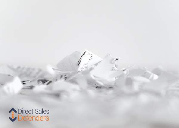 shred paper symbolizing negative content removal